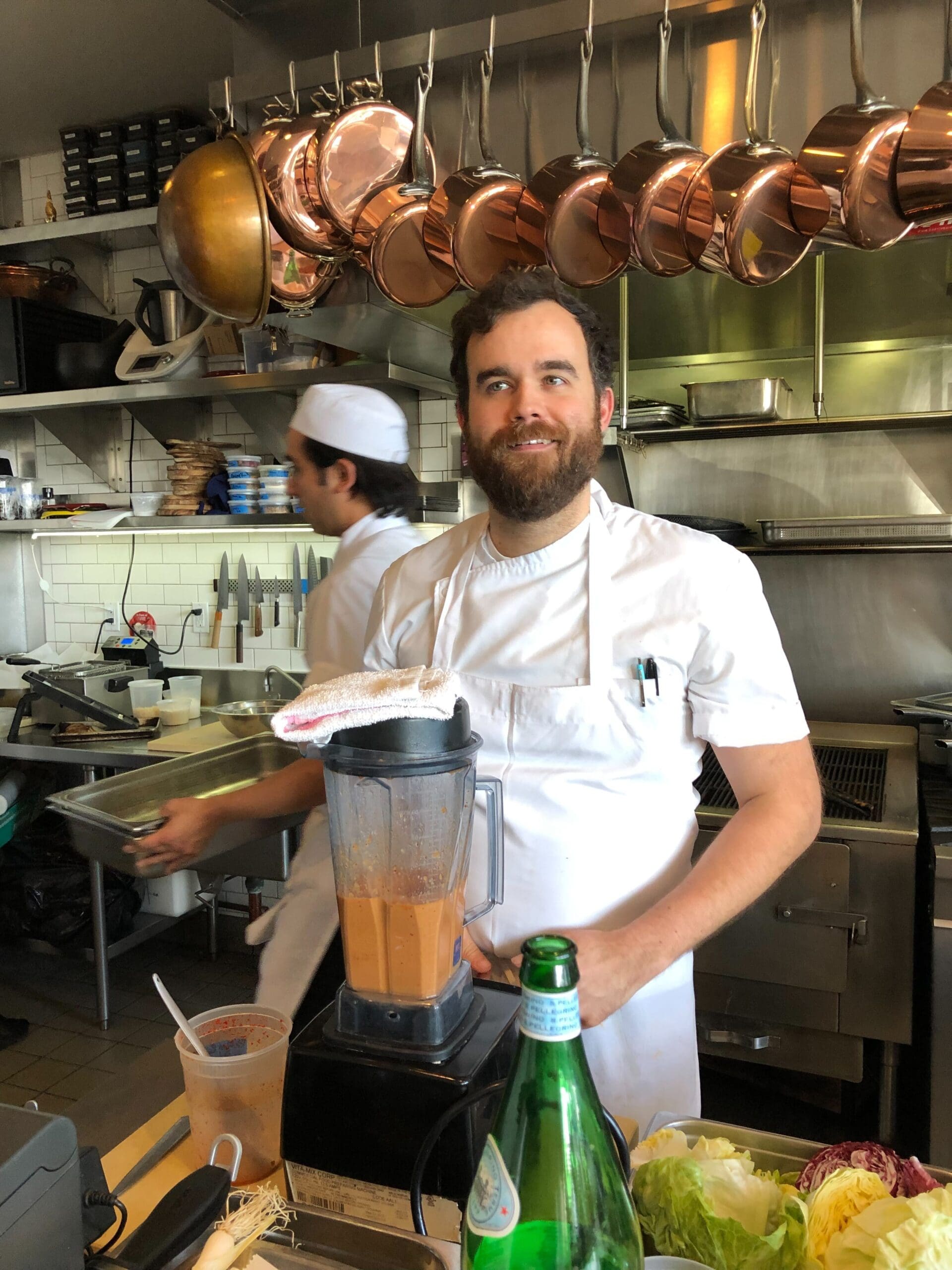 Image of Chef Jordan working in a fine dining restaurant kitchen